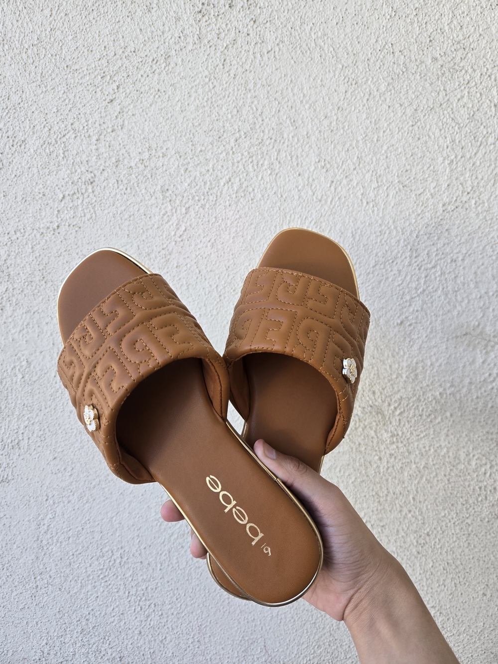 Bebe Cognac Quilted Slide Sandals with Logo Charm